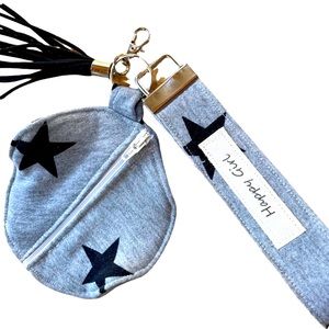 Wristlet with iPod holder/credit card holder